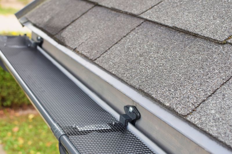 Gutter System with Protective Guards